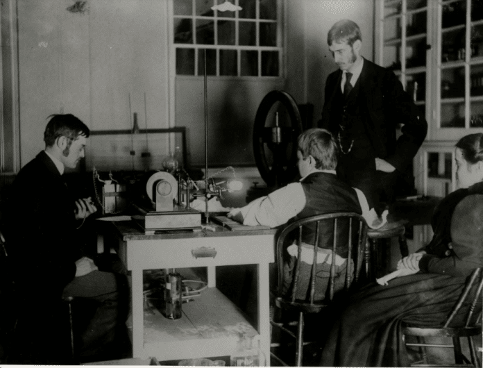 The event captured by photographer Henry H. Barrett on February 3, 1896, in Dartmouth’s Reed Hall.